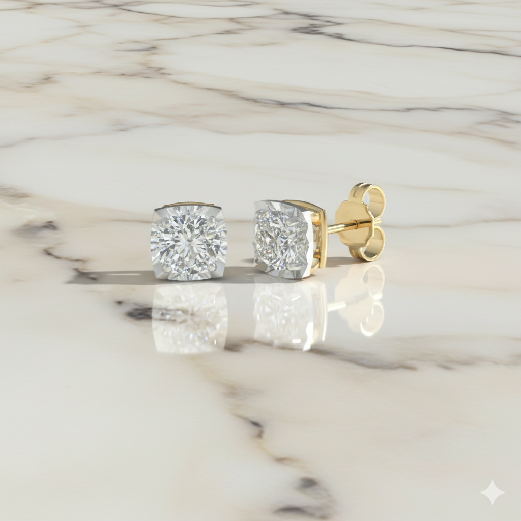 An angled view of a pair of 14K yellow gold classic diamond studs, showcasing the full design, displayed on a marble background.