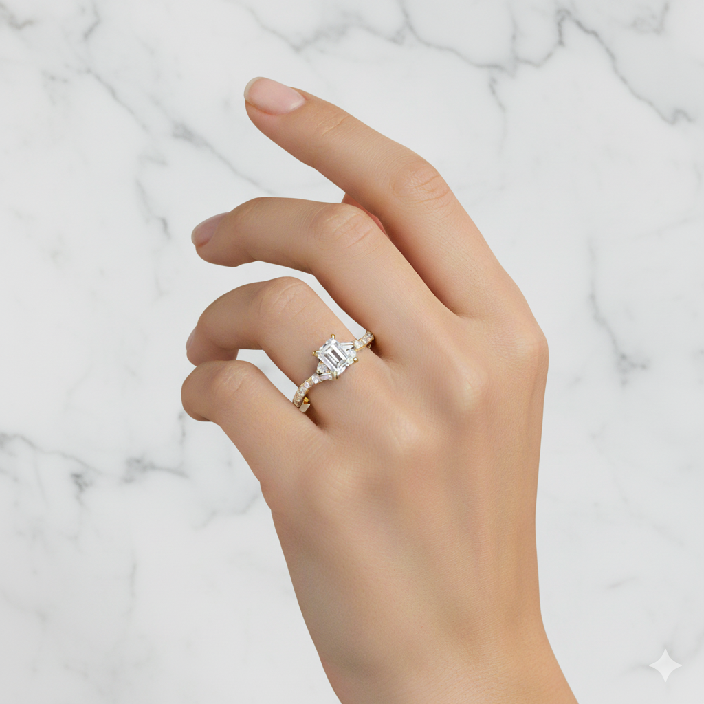 A top-down view of a 14K yellow gold ring with a central rectangular jewel, two smaller round gems on the sides, and a pavé band on hand.