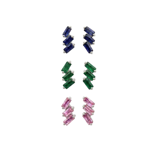 Three colorways in the cascading stud earrings featuring a vertical arrangement of three baguette-cut emerald or pink sapphires or blue sapphire. The rectangular gemstones are staggered in a step-like formation and held in a minimalist 18k white gold setting, shown against a clean, white studio background.