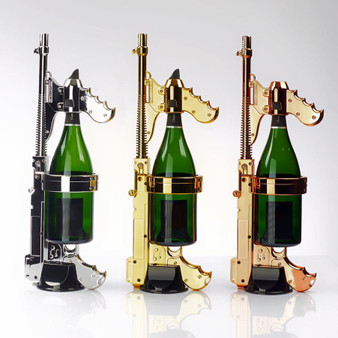 picture of three champagne guns, one gold, one rose gold, and one chrome