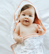 baby wrapped in bunny towel
