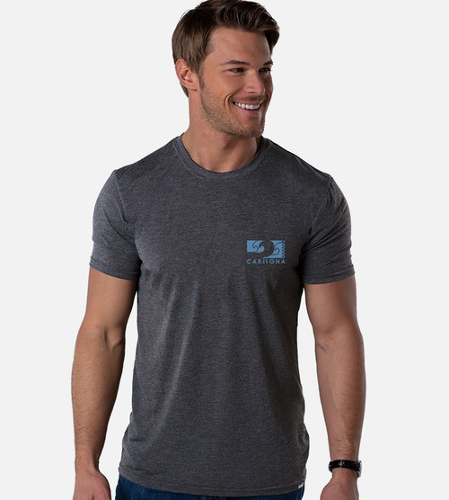 front view of model wearing charcoal crew tee with sun & surf blocks left chest graphic