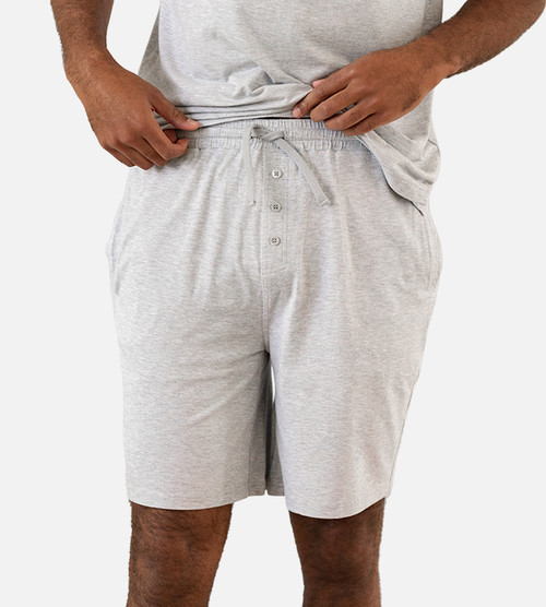 close-up front view of model wearing light gray shorts