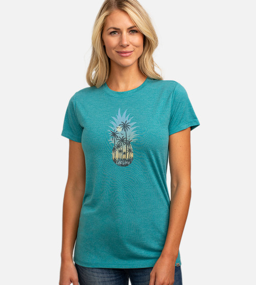 front view of model wearing crew tee with pineapple palms graphic