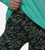 close-up of model wearing Geo Lines Carbon leggings showing the waistband