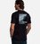 back view of model wearing wave back graphic tee