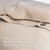 coconut button closure with reinforced button placket + corner ties to secure duvet