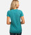 back view of model wearing tropical teal crew tee