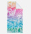 beach towel with ombre floral design with the corner folded over