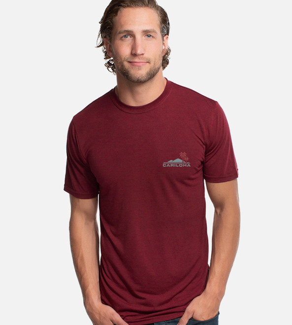 front view of model wearing rockwood red crew tee with iconic island & palms left chest graphic