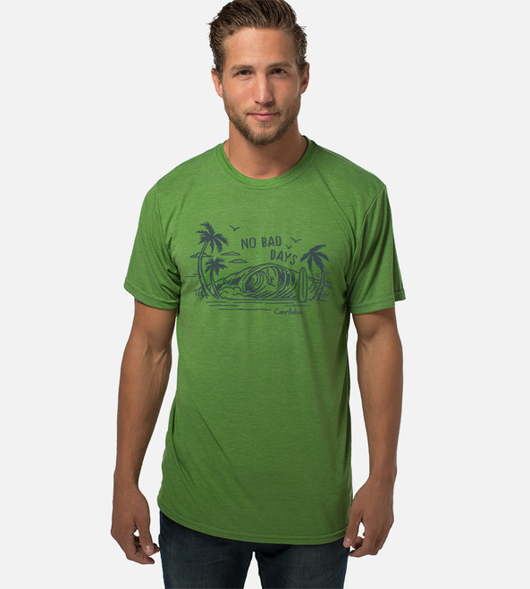 front view of model wearing palm green tee with no bad days design