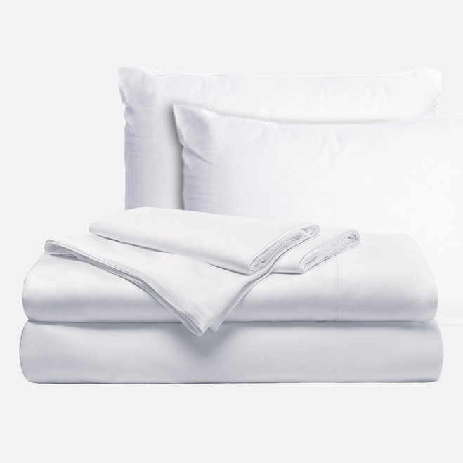 Bundle of white sheets and 4 pillowcases