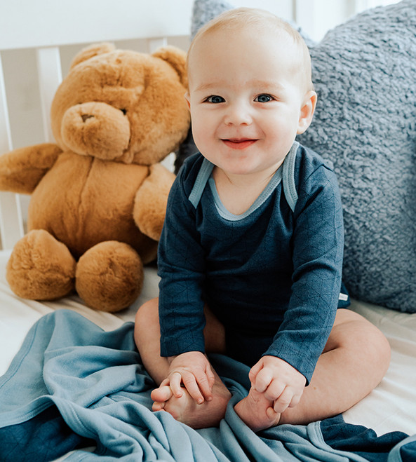 baby in geo bodysuit