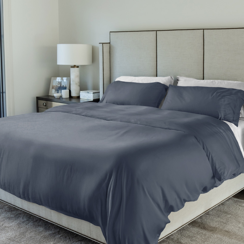 dark blue duvet cover on a bed