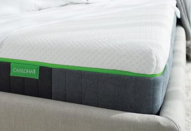 white sheets and pillows stacked