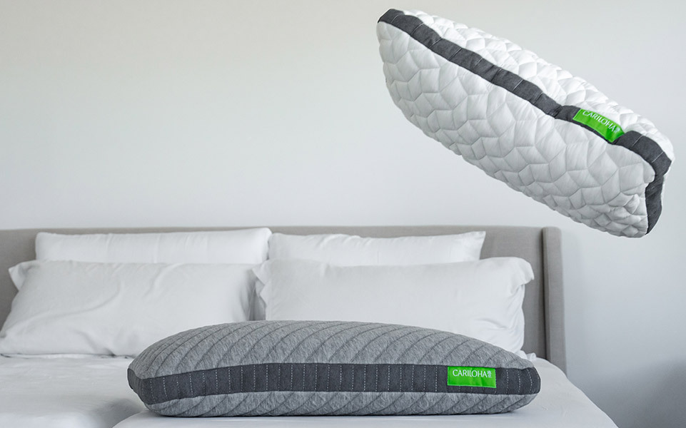 cariloha pillows on a bed