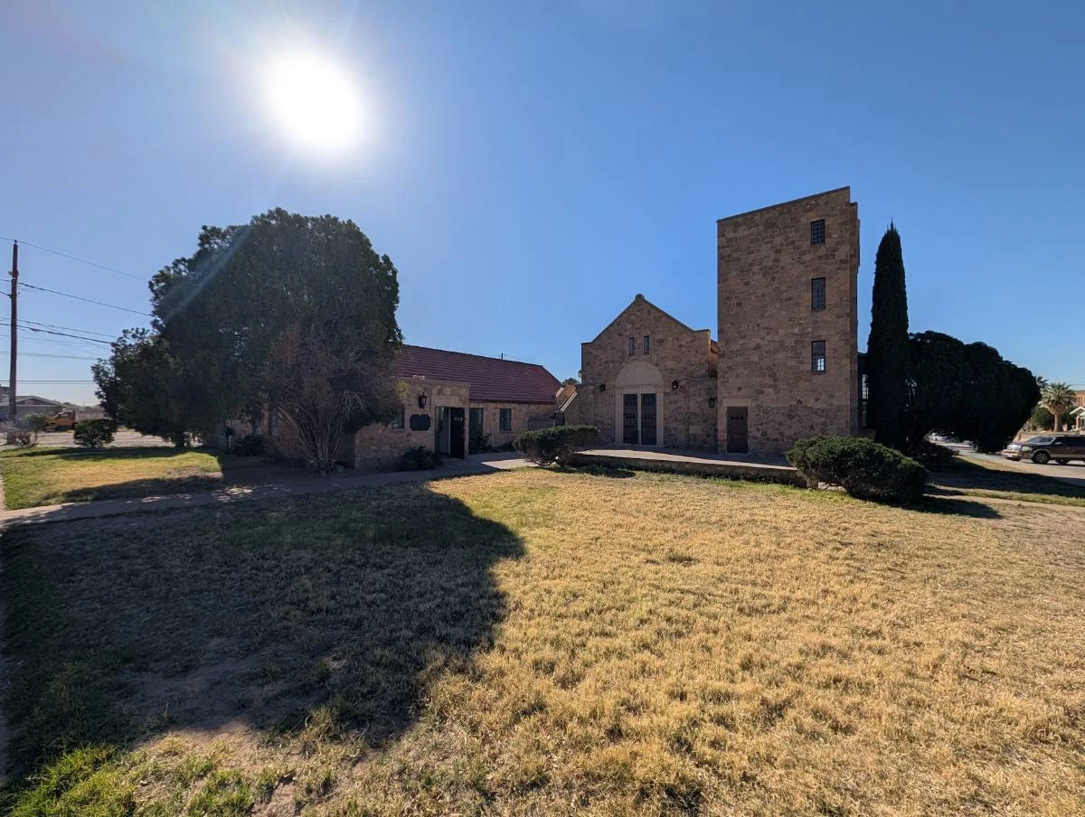 Historic stone building with a tower