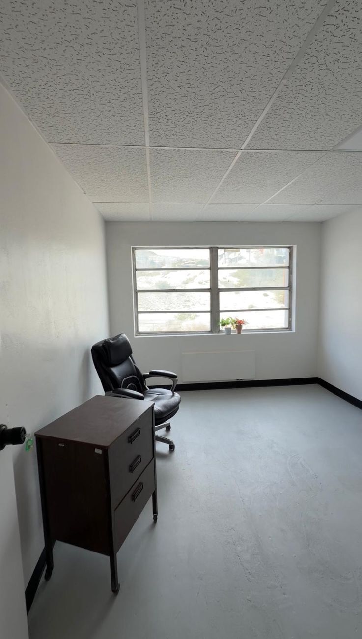 Furnished private office with a window