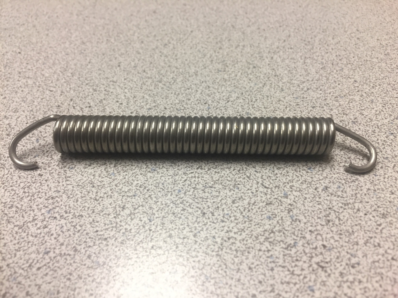 Sideload extension spring