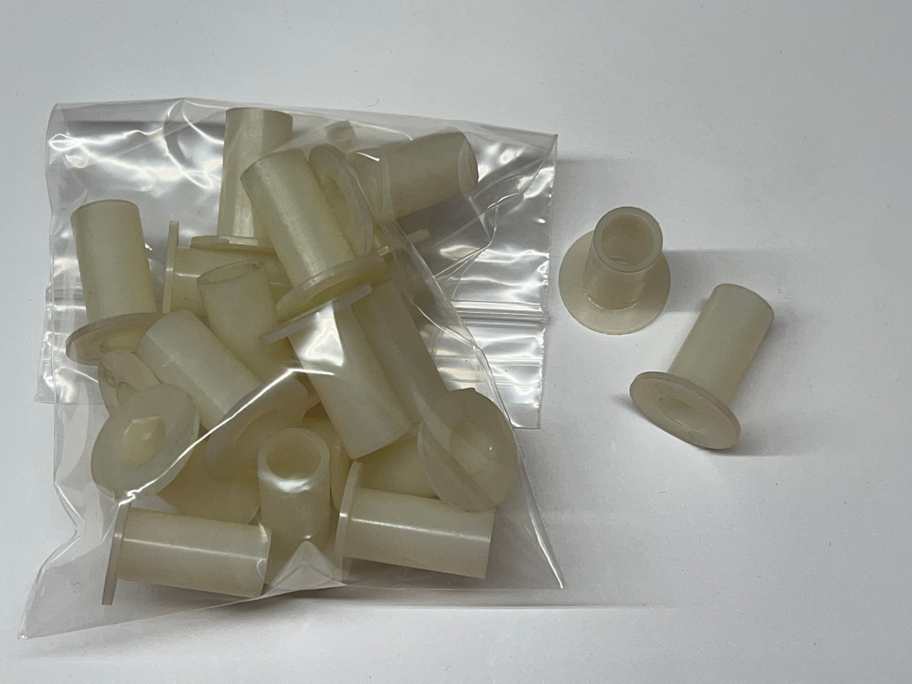 NWOV White Plastic Bushing - 20 Pieces