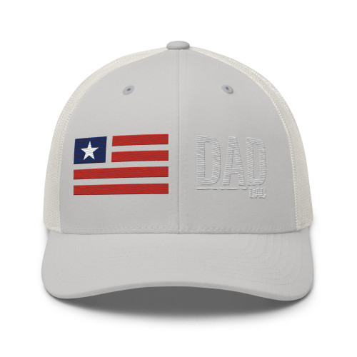 Silver six-panel mesh-back trucker cap with embroidered Flag DAD logo, front view — DAD all caps