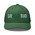 Evergreen Grass DAD six-panel mesh-back trucker cap with embroidered Grass DAD logo, front view — DAD all caps