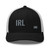 Black/White six-panel mesh-back trucker cap with embroidered Girl DAD logo, front view — DAD all caps