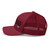 Cranberry six-panel mesh-back trucker cap with embroidered Girl DAD logo, left side view — DAD all caps