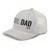 Silver six-panel mesh-back trucker cap with embroidered Girl DAD logo, left-front view — DAD all caps