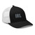 Black/White six-panel mesh-back trucker cap with embroidered Girl DAD logo, right-front view — DAD all caps