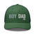 Evergreen six-panel mesh-back trucker cap with embroidered Boy DAD logo, front view — DAD all caps
