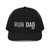 Black six-panel snapback-style trucker cap with embroidered Run DAD logo, front view — DAD all caps
