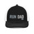 Black/White six-panel snapback-style trucker cap with embroidered Run DAD logo, front view — DAD all caps