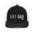 Black/White six-panel snapback-style trucker cap with embroidered Lift DAD logo, front view — DAD all caps