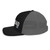 Black/Charcoal six-panel snapback-style trucker cap with embroidered Hike DAD logo, left side view — DAD all caps