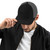 Black/Charcoal six-panel snapback-style trucker cap with embroidered Night Owl DAD logo, front view — DAD all caps