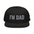 Black structured high-profile six-panel snapback hat with embroidered I'm DAD logo, front view — DAD all caps