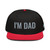 Red/Black structured high-profile six-panel snapback hat with embroidered I'm DAD logo, front view — DAD all caps