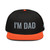 Orange/Black structured high-profile six-panel snapback hat with embroidered I'm DAD logo, front view — DAD all caps