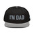 Gray/Black structured high-profile six-panel snapback hat with embroidered I'm DAD logo, front view — DAD all caps