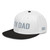 Black/White structured high-profile six-panel snapback hat with embroidered I'm DAD logo, left-front view — DAD all caps
