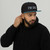 Aqua Blue/Black structured high-profile six-panel snapback hat with embroidered I'm DAD logo, front view — DAD all caps