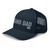 Navy six-panel mesh-back trucker cap with embroidered Grand DAD logo, left-front view — DAD all caps