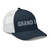 Navy/White six-panel mesh-back trucker cap with embroidered Grand DAD logo, right-front view — DAD all caps