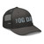 Charcoal six-panel mesh-back trucker cap with embroidered OG DAD logo, right-front view — DAD all caps