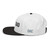 Black/White structured high-profile six-panel snapback hat with embroidered Grill DAD logo, left side view — DAD all caps
