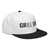 Black/White structured high-profile six-panel snapback hat with embroidered Grill DAD logo, right-front view — DAD all caps