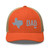 Rustic Orange/Khaki six-panel mesh-back trucker cap with embroidered Texas DAD logo, front view — DAD all caps