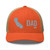 Rustic Orange/Khaki six-panel mesh-back trucker cap with embroidered Cali DAD logo, front view — DAD all caps