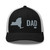 Black/White six-panel mesh-back trucker cap with embroidered New York DAD logo, front view — DAD all caps